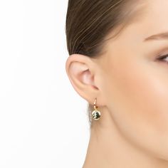 Elevate your style to celestial heights with our Gold Lunar Moon Huggie Hoop Earrings. These earrings feature a round disc dangling from the hoop, half of which is textured to depict the crescent moon cradled by the full moon, a design that whispers tales of the lunar mystique. The moon in jewellery often represents growth, creativity, and the unfolding of spiritual layers, imbuing these earrings with profound symbolism alongside their aesthetic appeal. Handcrafted in 925 Sterling Silver dipped in 18ct gold.   Packaging:  This item is presented in Latelita London signature packaging.  Care Instructions:  To maintain your jewellery, wipe gently with a damp cloth that is soft and clean. Do not soak in water. Avoid contact with soaps, detergents, perfume, or hair spray.  Do not store inside t Adjustable Moon Charm Earrings, Everyday Moon Charm Drop Earrings, Yellow Gold Drop Earrings With Moon Charm, Adjustable Moon Charm Hoop Earrings, Adjustable Hoop Earrings With Moon Charm, Everyday Moon Charm Round Earrings, Minimalist Round Earrings With Moon Charm, Elegant Single Round Disc Earring, Elegant Small Hoop Earrings With Moon Charm