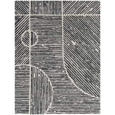 a black and white rug with an abstract design