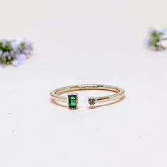 14K Solid Yellow GOLD Stackable Ring One of a Kind Everyday Open Cuff Ring in 14k Gold For Her from our Capsule Jewelry Collection. NATURAL EMERALD and DIAMOND Open Cuff Ring in 14k SOLID YELLOW GOLD. Emerald Rectangular Faceted Stone and Diamond is set in Bezel Setting in our Factory. Gold Ring AAA+ Quality Emerald Diamond Precious Gemstone Ring. Etsy Handmade Jewelry, Handmade Ring For Wedding Gift , Engagement Gift  Anniversary Gift (Stamped 585 /14k ) Ring. Perfect Gift For Everyday or Gift for a May Birthstone for Your Loved Ones. ►  DIMENSIONS : ◆ Gemstone : Emerald and Diamond                                                            ◆ Stone size : 4*2 mm  ◆ Gross Weight : 1.160 grams ◆ Stone Weight :  Emerald 0.11 Ct                                                         :  Diamo May Birthstone Stackable Open Rings In Fine Jewelry, May Birthstone Baguette Cut Diamond Rings, 14k Gold May Birthstone Open Ring, Modern Open Emerald Ring Birthstone, 14k Gold Open Ring For May Birthstone, Emerald Diamond Open Ring, May Birthstone Open Ring In Fine Jewelry Style, Fine Jewelry May Birthstone Open Ring, Baguette Diamond Open Ring For Promise