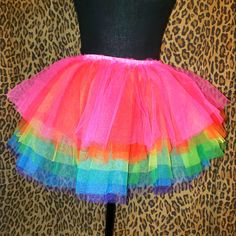 Nwt Club Exx Tutu Skirt Size Xs From Dolls Kill Elastic Waist Waist Measures 13" Unstretched Up To 17" Length 14" Club Exx Just Dance Tutu Skirt Cuz Life's A Celebration. This Mini Skirt Comes In A Layered Tulle Construction, With An Elastic Waistband, And Rainbow Pattern. Spring Costume Skirt With Attached Cancan, Can-can Skirt For Costume Party, Party Mini Skirt With Ruffles In Purple, Party Purple Ruffled Mini Skirt, Spring Fairy Kei Party Skirt, Spring Party Can-can Petticoat, Rave Skirt For Spring Party, Spring Rave Skirt For Party, Spring Rave Party Skirt