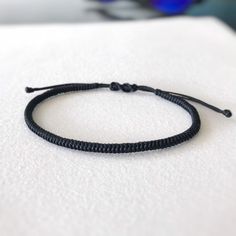 Simple Braided Bracelet Waxed Cord, Unisex Jewelry Gift for Friends MATERIAL 🔹 Waxed Nylon Cord 🔹 Bracelet width -3mm 🔹 Easy to put on and adjust with the adjustable sliding closure. Standard women size 6 - 7.5 inches Standard men size 6.5 - 8 inches All items are handmade with love just for you! 🔹 Check out our shop for more anklets https://www.etsy.com/shop/JustSeedBeads?ref=seller-platform-mcnav§ion_id=23857241 Thank you! Minimalist Adjustable Waxed Cord Bracelets, Minimalist Braided Bracelet With Sliding Knot For Friendship, Minimalist Braided Friendship Bracelets With Sliding Knot, Minimalist Braided Friendship Bracelet With Sliding Knot, Minimalist Everyday Resizable Braided Bracelets, Casual Cord Bracelet As Gift, Casual Cord Bracelet Perfect For Gifts, Casual Cord Bracelet For Gift, Minimalist Adjustable Braided Bracelet With Sliding Knot