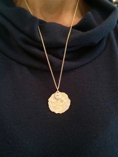 If you want to pay with PayPal, please contact me. Necklace details: * The necklace and the pendant made from 14 karats solid yellow gold. * Chain length 17.7inc\ 45cm. * 1 Diamond 0.50ct HVS1. * 50 Diamonds 0.50ct 0.01ct each HVS1. * Gold pendant size 1inch/ 25mm. Each pendant is custom made unique and will have slight variations in shape. Special delicate gold pendant bezel set with natural diamonds. Look like an antique pendant removed from the ground. Hand-made one of a kind. Chain available Elegant Gold Diamond Necklace With Large Pendant, Diamond Necklace With Large Pendant As Gift, Elegant Gold Diamond Necklace With Coin Pendant, Luxury Gold Hammered Necklaces, Luxury Gold Hammered Necklace, Gold Sterling Silver Necklace With Single Cut Diamonds, Diamond Necklace With Large Pendant For Anniversary, Gold Necklace With Single Cut Diamonds For Gifts, Gold Diamond Medallion Necklace