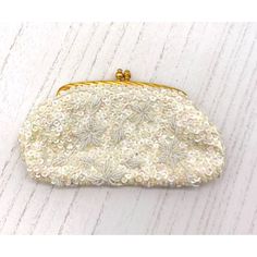 Features: * Vintage clutch * White sequins * inside opening, 3" opening * NOTE one small black bead, see last photo * made in Hong Kong * Item# IN24006 Size: 7" X 4" X 1" Condition: Pre-Owned Good Gently Loved...  Thank you for visiting our shop! Glamorous White Embellished Clutch, Elegant White Clutch Coin Purse, White Beaded Evening Clutch, Glamorous White Beaded Evening Bag, Formal White Beaded Clutch, Vintage White Clutch For Party, Vintage Clutch, Gold Sequins, Clutch Handbag