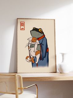 a framed art print of a cartoon character holding a cat in front of a white wall