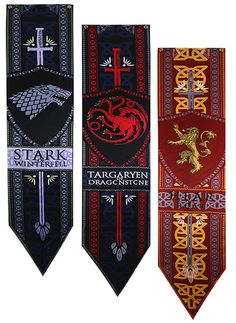 three game of thrones banners hanging from the side of a wall, each with a dragon on it