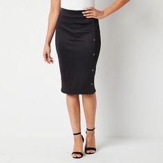 Pencil skirts are a versatile piece in your wardrobe for a date night or a business meeting, and this sleek style from Bold Elements is perfect for keeping in your rotation. It's cut for a knee-length from a stretch scuba fabric with a comfortable elastic waistband and faux button detailing along the front.Front Style: Flat FrontFeatures: Stretch FabricClosure Type: Full ElasticClosure Location: FrontRise: Mid RiseApparel Length: 26.5 InchesFiber Content: 92% Polyester, 8% SpandexFabric Descript Womens Pencil Skirt, Midi Pencil Skirt, Professional Wear, Scuba Fabric, Stick Foundation, Womens Pencil Skirts, Sleek Style, Pencil Skirt Black, Pencil Skirts