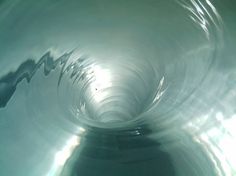 an image of a bowl with water in it that is very close to the camera