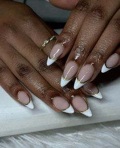 Gorgeous, almond Frenchies with gold line cute for any season #fashion #nails #nailart #nailsofinstagram #frenchnails #gold #bows #newyearnails #newyearnewme Almond French Tip Nails With Gold Line, Almond French White Nails, Black Tip With Gold Line Nails, Black French Tip Nails Almond With Gold, White French Tip With Gold Chrome, Gold Line French Tip, New Years Inspo Nails, Almond French Tip With Gold Line, French Gold Tips