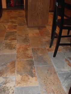 the kitchen floor is clean and ready to be used as a dining room or bar