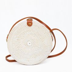 The Ata Bali is the must-have crossbody bag for all of your warm-weather events - from vacations to beach days. Keep your belongings secure with the Snap closure and the beautiful fabric-lined interior. Wipe Clean / Rattan August Birthstone Jewelry, July Birthstone Jewelry, Artisan Gift, Zodiac Jewelry, Gifts For New Mums, Jewelry Ring Box, Pearl Jewellery Earrings, August Birth Stone, Evil Eye Jewelry