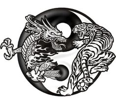 a black and white image of two dragon in a yin - yang style tattoo design