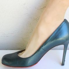 Christian Louboutin Simple Metallic Green Leather Pumps. $649 Retail. Eu 37 Estimated To Fit Best As A Us 7. Insole Is 9 5/8 Inch. Heel Is 4 Inches. Good Condition. Comes With Box. Formal Green Heels With Leather Lining, Louboutin Shoes, Green Leather, Leather Pumps, Christian Louboutin Shoes, Shoes Women Heels, Christian Louboutin, Shoes Heels, Size 7