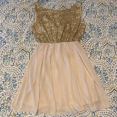 Nwt Perfect Party Dress With Gold Sequins Up Top And Flowy, Fully Lined Ivory Below. Size S. V-Back. Exposed Back Zipper. Spring Sleeveless Holiday Dress For Weddings, Sleeveless Holiday Dress For Spring Wedding, Spring Wedding Sleeveless Holiday Dress, Gold A-line Dress For Party, Gold A-line Party Dress, Beige A-line Party Dress, Cream Summer Party Dress, Gold Sequin Prom Dress For Spring, Gold Mini Dress For Spring Wedding