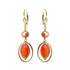 Tiered carnelian earrings with fresh water pearl accents on gold filled silver leverback clasps. Stones: Carnelian, Fresh Water Pearl (color enhanced) Stone Size: Carnelian approx. 1/2" long & 3/8" wide Dimensions: Earrings hang approx. 2" Style: Leverback Material: Gold Filled Silver Made in: USA Elegant Gold Carnelian Earrings, Pierced Carnelian Drop Earrings, Bohemian Gold Carnelian Earrings, Carnelian Gemstone Round Earrings, Orange Carnelian Round Earrings, Carnelian Earrings, Fresh Water Pearl, Gold Filled Earrings, Earring Hooks