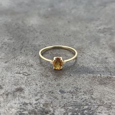 14k yellow gold petite citrine and diamond ring. 0.016cts of diamonds. Finger size 6. Yellow Gold Citrine Diamond Ring With Accents, Yellow Gold Diamond Ring With Citrine Accents, Citrine Diamond Ring With Accent Stones In Yellow Gold, Yellow Gold Citrine Diamond Ring With Accent Stones, 14k Gold Yellow Diamond Ring, Yellow Diamond Ring In 14k Gold, Yellow 14k Gold Diamond Ring, Classic Gold Topaz Birthstone Ring, 14k Yellow Gold Diamond Ring With Gemstone Accents