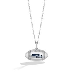 Show off your team spirit when you wear this Seattle Seahawks diamond accent football pendant from the True Fans Fine Jewelry Collection. Sterling Silver The Seattle Seahawks logo shines in navy and gray enamel at the center of this football-shaped design. Diamond accents and beading shimmer along vertical stripe details. This Sterling Silver pendant suspends along an 18.0-inch cable chain, with closure rings at 16 and 17 inches, that secures with a lobster clasp. Officially licensed NFL jewelry Nfl Jewelry, Seahawks Logo, Seattle Seahawks Logo, Football Necklace, Silver Prices, Black Necklace, Fine Jewelry Collection, Seattle Seahawks, Accessories Jewelry Necklace