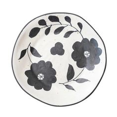 Bring the beauty of black and white to the table with this striking Flora Plate. Crafted from stoneware, this plate is finished with a lovely black and white pattern, creating a mesmerizing design that will elevate any space. Black And White Plates, Stoneware Bowl, Painted Plates, Hand Painted Plates, Creative Co Op, White Bowls, Antique Farmhouse, Pottery Painting, Floral Painting