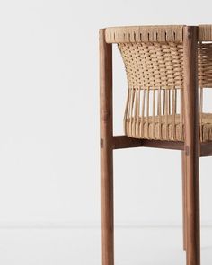 a wooden chair with woven seat and back