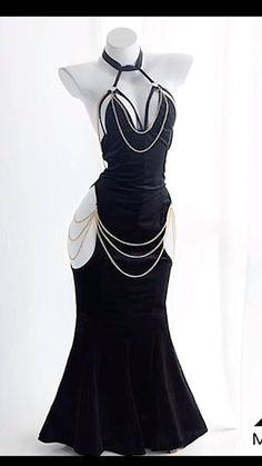 This dress is tailored from premium 4-way stretch velvet to beautifully enhance your figure. The delicate chain embellishments frame the bust, back, and hips.

Ideal for 'Fashion-Forward Evening Attire,' be the highlight of any upscale soiree. 

Material: Polyester Velvet
US women's size 
Fits true to size Gothic Bodycon Dress For Party, Gothic Backless Mini Dress For Party, Elegant Evening Bodycon Dress With Boning, Elegant Bodycon Dress With Boning For Evening, Elegant Backless Corset Dress For Evening, Gothic Backless Mini Dress For Evening, Elegant Party Body Chain, Elegant Bodycon Dress With Boning For Cocktail, Elegant Bodycon Cocktail Dress With Boning