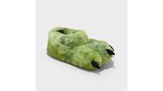 These Kai Dinosaur Claw Slippers from Cat & Jack™ will keep your child's feet toasty and cozy. The closed-toe slippers are made of faux fur with a slip-on design for quick and easy wear, and the black dino claws at the front, paired with a gray-and-brown silhouette, help make them an instant hit with your child. They also sport a no-heel design with an indoor outdoor outsole and grippers for versatile wear. Cat & Jack™ Classics with an imagination of their own. | Cat & Jack Boy's Green Kai Dinosaur Foot Slippers (Small) | Target Claw Slippers, Dinosaur Claw, Green Slippers, Jack Green, Toe Slippers, Heel Design, Cat & Jack, Designer Heels, Easy Wear