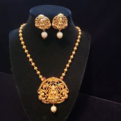 "Handmade Indian Temple Jewelry, best to wear it for traditional ceremonies or Indian wedding. This bridal jewelry has ethnic finish. It has Cubic Zircon stones with ruby and emeralds. It is a Bollywood style one gram jewelry. There are long and short patterns of Indian jewelry in Kundan, Pearls, CZ, American Diamond , ruby, emerald, Polki, kemp to suit every occasion of South Indian and North Indian weddings. Handmade Indian Jewelry item * Stunning Hand made Temple jewelry set. * Necklace Set i Festive Temple Necklace With Stone Work For Rituals, 22k Gold Temple Jewelry For Puja, Spiritual Wedding Jewelry With Peacock Design, Kundan Temple Jewelry Sets With Peacock Design, Gold Jewelry With Peacock Design For Rituals, Kundan Jewelry Sets With Peacock Design, Temple Jewelry Sets With Peacock Design For Festivals, Traditional Jewelry Sets For Navratri Rituals, Temple Style Bridal Necklace With Stone Work For Rituals