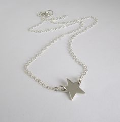 Silver Star Necklace, Lucky Star Necklace, Small Star Necklace, Simple Necklace, Bridesmaid Necklace, Charm Necklace, Best Friend Necklace **ABOUT THIS NECKLACE** The necklace in this listing is a shiny and polished sterling silver petite star that is perfect for everyday wear. This adorable pendant measures 13mm and drops from a sterling silver chain. I have closed this lovely necklace with a sterling silver spring clasp. ----------------------------------------------------- **MEASUREMENTS** -- Silver Star Necklace, Best Friend Necklace, Star Necklace Silver, Jewelry Accessories Ideas, Friend Necklaces, Necklace Simple, Funky Jewelry, Star Jewelry, Lucky Star