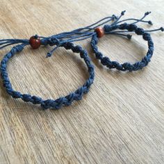 "These lovely bracelets were made using blue hemp cord. They are adjustable and designed for everyday wear. The big bracelet closes to around 6.5\" and opens to around 9\". The little bracelet will fit a 5\" wrist and opens to 7\". Please feel free to contact me if you have any questions For more Daddy and me/ Mom and Son Bracelets: https://www.etsy.com/shop/Fanfarria?section_id=17007792&ref=shopsection_leftnav_4 Check for Hemp Jewelry: https://www.etsy.com/shop/fanfarria?section_id=16963242 Adjustable Blue Beaded Bracelet With Waxed Cord, Blue Adjustable Cord Bracelet As A Gift, Blue Adjustable Cord Bracelet Gift, Blue Macrame Beaded Bracelets As A Gift, Bohemian Blue Waxed Cord Bracelet, Blue Adjustable Cord Friendship Bracelet Gift, Blue Friendship Bracelets With Sliding Knot, Blue Braided Bracelets With Adjustable Cord As Gift, Blue Braided Bracelet With Adjustable Cord As Gift