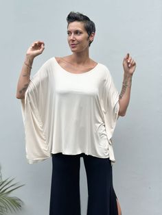 #color_cream Summer Batwing Sleeve Top For Layering, Relaxed Batwing Sleeve Summer Tops, Bohemian Batwing Sleeve Tops For Loungewear, Relaxed Fit Modal Tops For Summer, Bohemian Loungewear Tops With Batwing Sleeves, Bohemian Batwing Sleeve Loungewear Tops, Summer Viscose Top With Flutter Sleeves, Viscose Top With Flutter Sleeves For Summer, Viscose Flutter Sleeve Tops For Summer