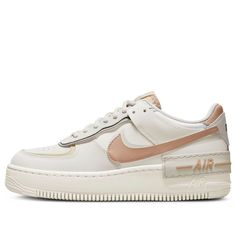 Add a classic design to your collection with the Nike Air Force 1 Low Shadow Fossil Sail Light Bone. Released in March of 2022, this sneaker is dressed with timeless elegance and will make a great addition to any outfit. The Sail/Fossil/Light Bone/Hemp design gives you an instant touch of sophistication, while the elastic laces provide an adjustable fit. Meanwhile, the visible Swoosh and heel logo feature iconic Nike branding for a look that nods to the past. With its stylish detailing and patterned rubber tread for better traction, this sneaker will help you find your footing no matter where life takes you. Grab your own pair today and make a statement in classic comfort and style with the Nike Air Force 1 Low Shadow Fossil Sail Light Bone. Low Top Nikes, Nike Original, Workout Sneakers, Nike Air Force 1 Shadow, Air Force 1 Shadow, Dr Shoes, Tenis Nike, Air Force 1 Low, Elastic Laces