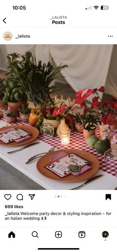 an image of a table setting with flowers and place settings on the table for guests to eat