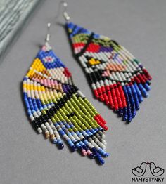 These Kandinsky inspired earrings are made of high-quality Czech beads and metal components. They are elegant, fashionable, and highly versatile. Features: Sterling silver hooks Color: 4 shades of blue, 2 shades of red, 2 shades of gray, 2 shades of green, 2 shades of pink, 2 shades of yellow, 2 shades of purple, 3 shades of brown, beige, black, white. Length: 12,5 cm (4.9 in) Width: 3,5 cm (1.4 in) This item is currently in stock. You must be completely satisfied. If you find merchandise unsati Artistic Earrings, Beadwork Earrings, Long Gold Earrings, Earrings Art, Gifts For Art Lovers, Red Earrings, Earrings Blue, Seed Bead Earrings, Czech Beads