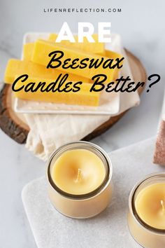 two candles sitting next to each other on top of a white table with text that reads are beeswax candles better?