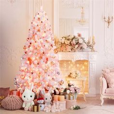 a pink christmas tree in a living room