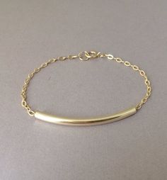 Gold Fill Curved Bar Bracelet Minimalist Brass Chain Bracelet For Gift, Minimalist Brass Chain Bracelet Gift, Classic Gold Bar Necklace For Everyday, Everyday Gold Oblong Jewelry, Simple Gold Bar Necklace With Delicate Chain, Minimalist Jewelry With Adjustable Oblong Chain, Simple Gold Brass Jewelry, Gold Bar Necklace With Adjustable Chain For Everyday, Simple Gold Bar Necklace For Gift