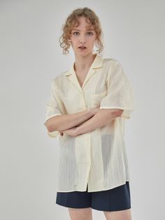 Editor's notesThis oversized shirt features semi sheer, soft and silky texture. It is accentuated with classic collar design, buttoned front silhouette and wide chest pocket. - Semi sheer silky fabric- Natural, oversized silhouette- Classic wide collar and buttoned front design- Split dolman sleeves for easy moodMeasurements(in.)Size One Size(XS-M)- Length: 28.74 in - Bust: 21.77 in - Hem: 23.03 in - Sleeve length: 17.24 in - Sleeve hem: 8.39 in - Armhole: 8.86 in * Model info: Height 5' 8Composition & Care- 82% Rayon, 18% Nylon- Dry Cleaning Designer- by OSTKAKA Silky Texture, Silky Fabric, Collar Designs, Oversized Silhouette, Oversized Shirt, Front Design, Dolman Sleeve, Chest Pocket, Short Sleeve Shirt