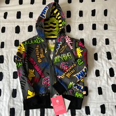 New With Tags On Multicolor Hooded Jacket For Streetwear, Winter Cartoon Print Outerwear For Streetwear, Multicolor Streetwear Hoodie, Playful Winter Sweatshirt For Playwear, Playful Winter Hoodie For Playwear, Sporty Long Sleeve Hoodie For Playtime, Winter Multicolor Sweatshirt With Logo Print, Multicolor Logo Print Sweatshirt For Winter, Winter Multicolor Logo Print Sweatshirt