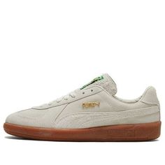 PUMA Unisex Army Trainer Bonanza Sneakers Ivory 381228-01 (SNKR/Retro/Skate/Low Top) Beige Rubber Sole Skate Shoes For Streetwear, Beige Skate Shoes With Rubber Sole For Streetwear, Urban Beige Sneakers With Gum Sole, Retro Beige Sneakers For Streetwear, Vintage Beige Sneakers For Sports, Beige Vintage Sneakers For Sports, Cream Leather Skate Shoes With Gum Sole, Cream Skate Shoes With Rubber Sole And Round Toe, Cream Skate Shoes With Round Toe And Rubber Sole