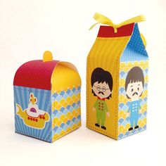 two boxes with cartoon characters on them sitting next to each other in front of a white background