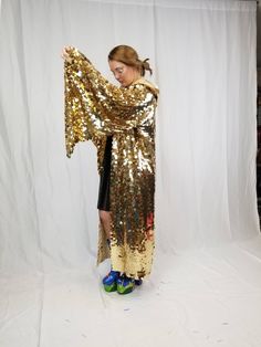 This shiney gold mirror maxi length hooded kimono robe with bell sleeves is the gold disco ball you've always dreamed of. These sleeves are incredible and like no other sequin kimono out there! It looks great on stage and is very demanding of attention. All eyes on you! It wears great from day to night, is unlined, and has a mesh foundation so it does not get too hot while you are dancing your heart out all day and night long. This stunning piece made for a Golden Goddess was made with professio Gold Long Sleeve Kimono For Party, Festive Gold Long Sleeve Kimono, Rave Kimono, Sequin Kimono, Rave Music, Golden Goddess, Purple Butterfly, Gold Sequin, Gold Mirror