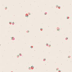 a pink wallpaper with strawberries and polka dots on the bottom half of it