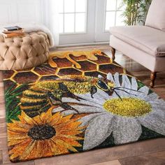 a rug with flowers and bees on it