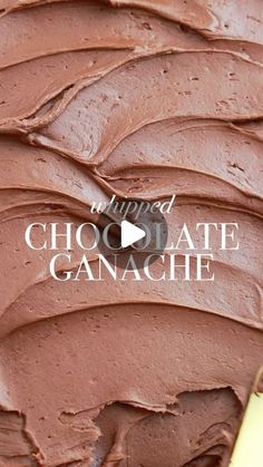 chocolate ganache is being spread on top of a cake with the words, whipped chocolate ganache