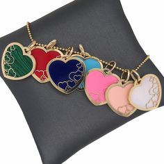 𝓦𝓮𝓵𝓬𝓸𝓶𝓮 𝓽𝓸 𝓛𝓲𝓸𝓷𝓱𝓮𝓪𝓻𝓽 𝓳𝓮𝔀𝓮𝓵𝓻𝔂 𝓢𝓱𝓸𝓹 ♥ Lovely Inlay Gemstone Padlock Heart Charms crafted in 14K Italian Gold with the choice of Red Coral, Peach Coral, Pink Paste, Lapis, Mother of Pearl, Turquoise, or Malachite. This beautiful and delicately designed multiple hearts within a heart Charm, is perfect for anyone near and dear. The Chain in the pictures are not included and for display purposes only. Please allow 1-5 weeks for delivery. *Please check measurements below, i Heart Cut Enamel Jewelry For Gifts, Luxury Heart-shaped Enamel Jewelry, Double Heart Enamel Jewelry For Gifts, Multicolor Heart Pendant Jewelry For Mother's Day, Multicolor Heart Cut Jewelry For Valentine's Day, Multicolor Double Heart Jewelry For Valentine's Day, Valentine's Day Multicolor Double Heart Jewelry, Multicolor Double Heart Jewelry Gift, Multicolor Double Heart Jewelry For Gift