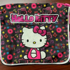 2003 Hello Kitty Messenger Bag, Bookbag, Backpack. Has A Pink Adjustable Strap At The Top And Fastens With Velcro On The Inside Of The Front Flap. Fits A 13” Macbook A Side Pouch To Hold Water Bottles, Etc. See Pics/Vid For Better Description And Approx. Measurements. (Note Bag On Vid Is The Same Size And Measurements Just Different Design) #Hellokitty #Sanrio #Powerpuffgirls #Strawberryshortcake #Messengerbag Pink Hello Kitty Print Bag For Back To School, Pink Rectangular Backpack With Cat Design, Pink Hello Kitty Print Standard Backpack, Pink Hello Kitty Print Backpack, Pink Cat Design Rectangular Backpack, Pink Hello Kitty Rectangular Shoulder Bag, Pink Hello Kitty Standard Backpack, Pink Backpack With Cat Design, Pink Hello Kitty Backpack