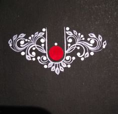 a black table with white and red designs on it