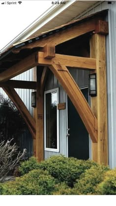 Pin by Teresa Smith on My Nest in 2022House awningsHome exterior makeoverTimber frame porch Exterior Shudder Ideas, Exterior Overhang Ideas, Wood Awnings Over Doors, Door Awnings Exterior Diy Wood, Entryway Overhang, Wood Awning Over Door, Front Porch Overhang Ideas, Gables On House Exterior, Awnings Over Doors