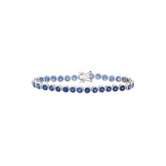 Lab-created sapphire gemstones give this sterling silver tennis bracelet alluring appeal.BRACELET DETAILSLength: 7.25 in. Clasp: boxMetal: rhodium-plated sterling silverSTONE DETAILSStone type: lab-created sapphireTotal weight: 8 1/2 ct. Shape: roundSetting: bezel Size: 7.25". Color: Blue. Gender: female. Age Group: adult. Sapphire Tennis Bracelet Fine Jewelry With Prong Setting, Silver Sapphire Tennis Bracelet, Silver Sapphire Tennis Bracelet With Brilliant Cut, Classic Sapphire Tennis Bracelet With Prong Setting, White Gold Sapphire Gemstone Tennis Bracelet, Sapphire Tennis Bracelet With 17 Jewels, Sapphire Gemstone Tennis Bracelet In Fine Jewelry Style, Fine Jewelry Sapphire Tennis Bracelet With 17 Jewels, Fine Jewelry Sapphire Tennis Bracelet