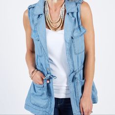 This Is A New With Tags Evereve Sanctuary Day Trip Light Weight Chambray Denim Vest And A Size Extra Small (Xs). It Has A Drawstring Waste, A Single Snap Button At The Waste, And Plaque It Details On The Shoulder. Very Cute And Stylish! Perfect For The Transition From Summer To Fall Chic Medium Wash Denim Outerwear For Summer, Chic Summer Outerwear Medium Wash, Summer Medium Wash Outerwear For Work, Casual Light Wash Denim Vest For Work, Utility Denim Top For Spring, Denim Blue Summer Workwear Outerwear, Denim Blue Summer Outerwear For Work, Spring Utility Cotton Denim Top, Blue Utility Top For Spring