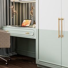 a white desk with a laptop on top of it next to a cabinet and chair