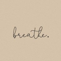 the word breathe written in cursive writing on a beige background with black ink